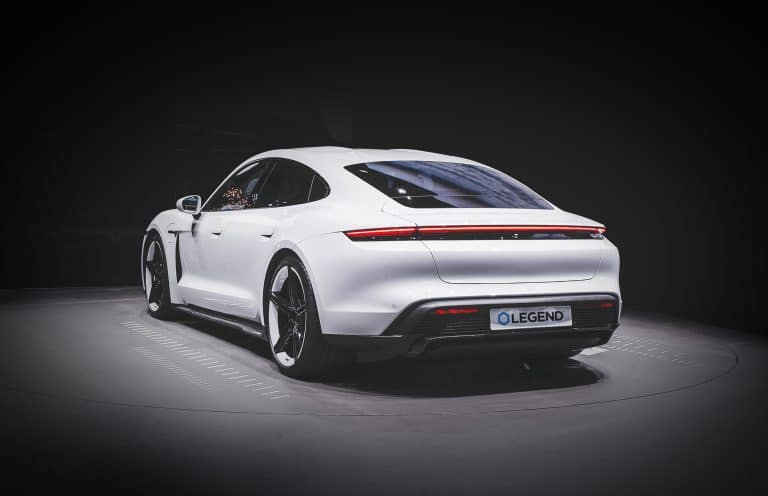 Artic White™ Porsche with Legend plate in shadows, showcasing premium Paint Protection Film for Cars